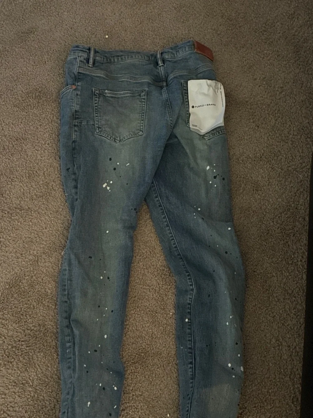 Slim Light Blue Men’s Jeans with Copper Rivet Accent